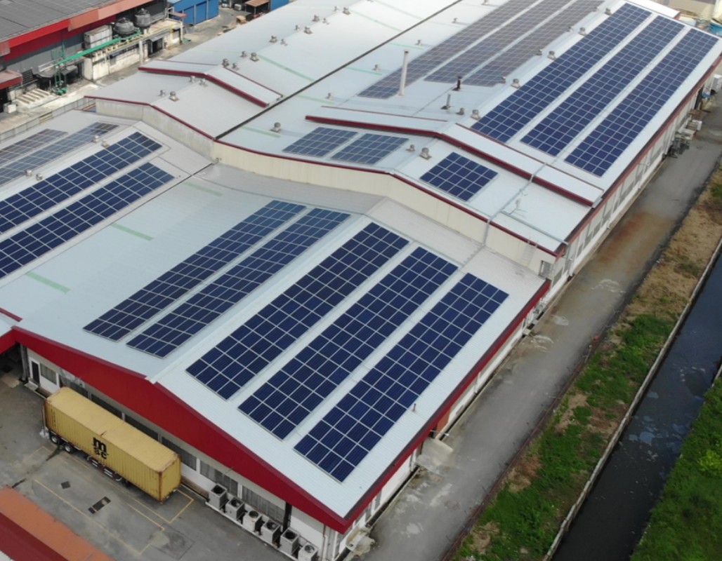 Glove Manufacturer with solar panels on rooftop