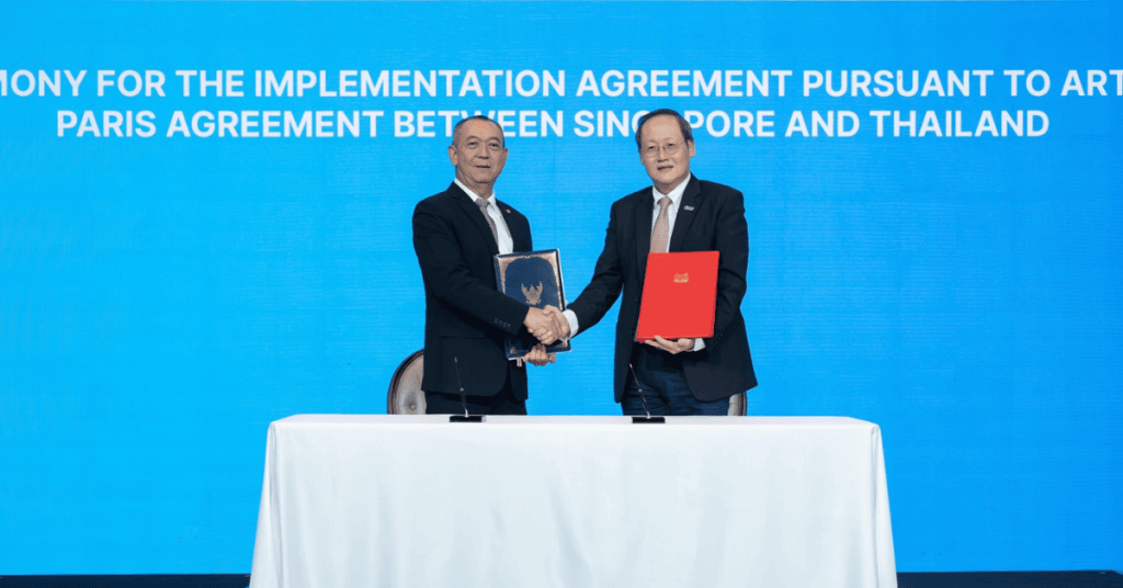 Thai official Chalermchai Sri-on with Singapore official Dr Tan See Leng.